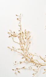 Close-up of greenery along the garland on this Gold Metallic Mini Leaf Branch Branch Accent
