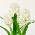 Close-up of leaf foliage texture on this White Hyacinth Bulbs Artificial Indoor Houseplant in Blue