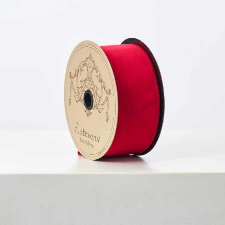 Close-up of blooms and berries on this D. Stevens Christmas Red Taffeta Lined Ribbon Spool