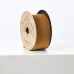 Close-up of blooms and berries on this D. Stevens Golden Brown Taffeta Lined Ribbon Spool