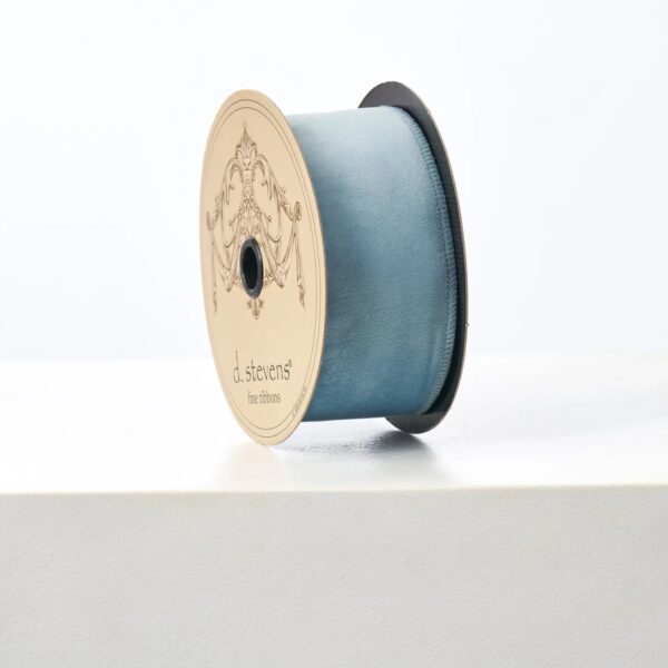 Close-up of blooms and berries on this D. Stevens Soft Blue Taffeta Lined Ribbon Spool
