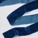 Alternate angle of the Blue Raw Edge Frayed Velvet Frayed Velvet Ribbon showing wreath face