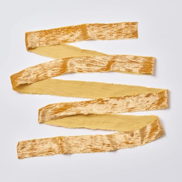 Close-up of blooms and berries on this Golden Mustard Raw Edge Frayed Frayed Velvet Ribbon