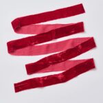 Close-up of blooms and berries on this Burgundy Red Raw Edge Frayed Frayed Velvet Ribbon