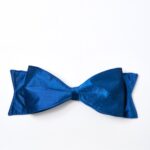 Alternate angle of the Large Lux Midnight Blue Velvet Christmas Tree Bow showing wreath face
