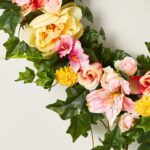 Close-up of blooms and berries on this Heart Throb - Yellow Peony Valentine's Day Wreath