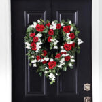 Alternate angle of the Red Rose, White Bellflower Day Heart Wreath showing wreath face texture