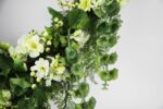 Detail view of layered greenery detail from the Lucky In Love - Bells Day Heart