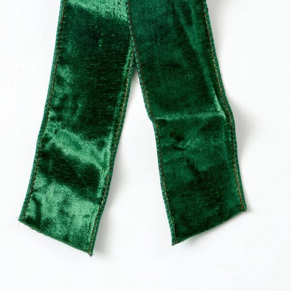 Close-up of blooms and berries on this Hunter Green Velvet Reversed Metallic Drape Loop Bow
