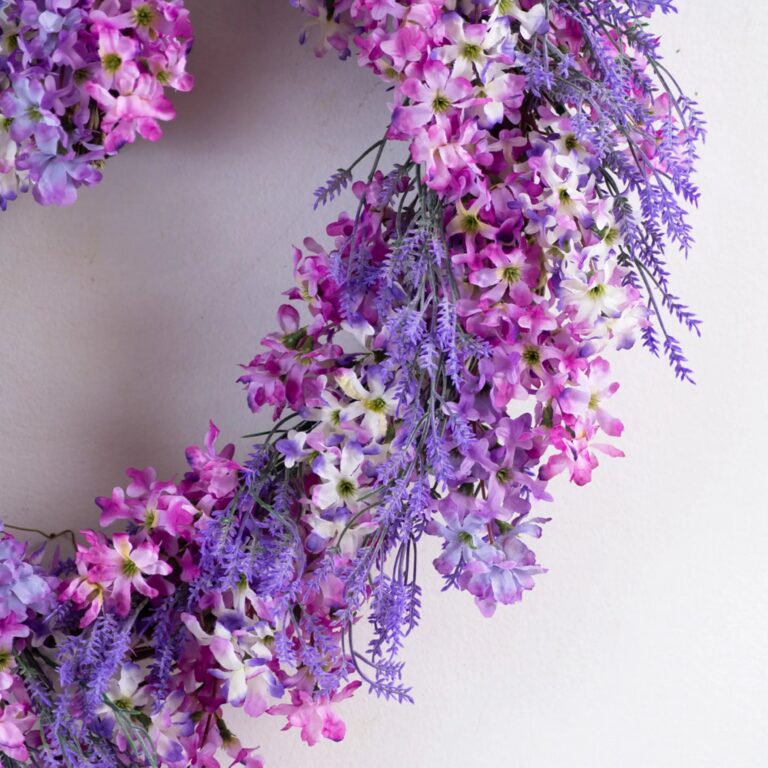 Close-up of blooms and berries on this Lavender and Lilac Spring Summer Door Heart Wreath