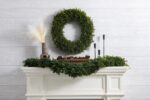 Alternate angle of the Green Boxwood Artificial All Seasons Greenery Mantel Garland showing full length