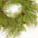 Alternate angle of the Cedar and Pine Mixed Winter Mini Candle Wreath showing wreath face