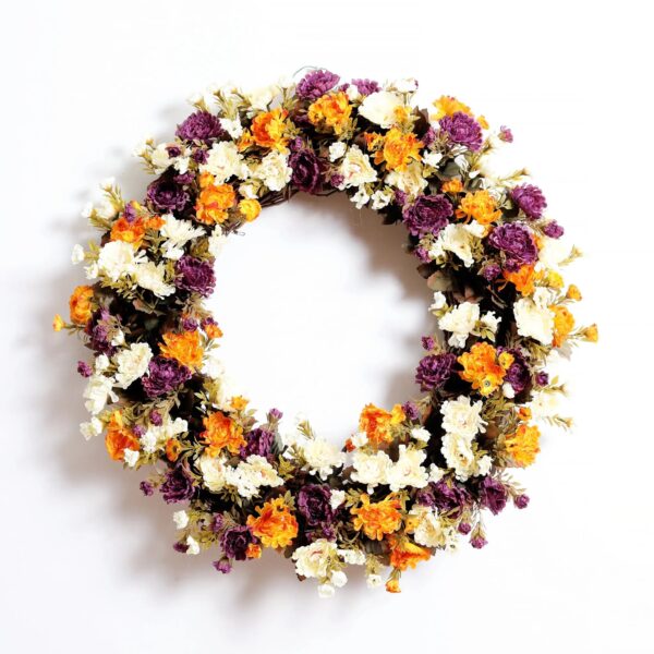 Close-up of blooms and berries on this Mini Mum Gold, Purple, Floral Autumn Wreath