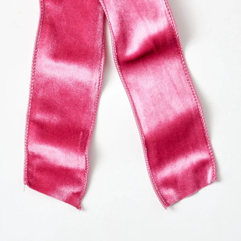 Close-up of blooms and berries on this Pretty Pink Velvet Wire Drape Loop Bow