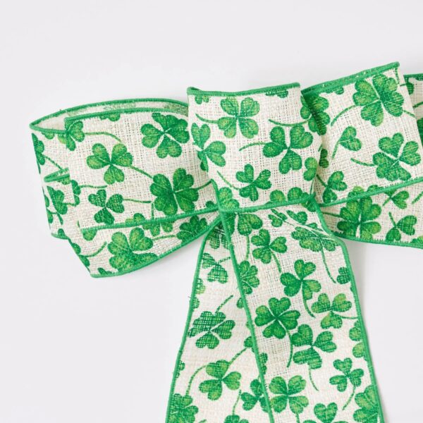 Close-up of blooms and berries on this White and Green Shamrock St. Hand Tied Bow
