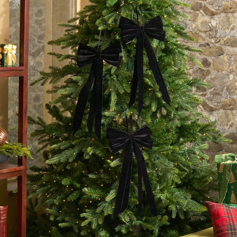 Close-up of blooms and berries on this Elegant Black Velvet Double Tailed Holiday Christmas Bow