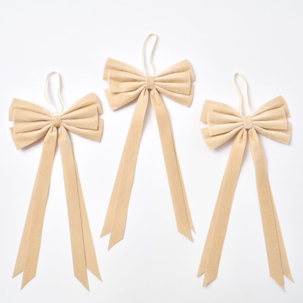 Close-up of blooms and berries on this Elegant Champagne Velvet Double Tailed Holiday Christmas Bow