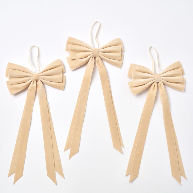Close-up of blooms and berries on this Elegant Champagne Velvet Double Tailed Holiday Christmas Bow