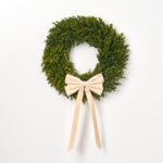 Side view of the Elegant Champagne Velvet Double Tailed Holiday Christmas Bow revealing frame and