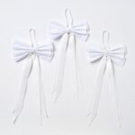 Close-up of blooms and berries on this Elegant Snow White Velvet Double Holiday Christmas Bow