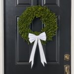 Side view of the Elegant Snow White Velvet Double Holiday Christmas Bow revealing frame and