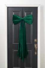 Alternate angle of the Extra Large Green Velvet Luxury Holiday Christmas Bow showing wreath face