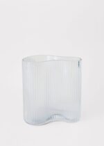 Alternate angle of the Clear Glass Ridged Asymmetrical Vase Ridged Asymmetrical Vase showing bloom arrangement