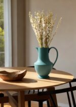 Close-up of vase silhouette detail on this Sir Madam Verdant Green Large Stoneware Pitcher Vase