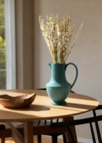 Close-up of vase silhouette detail on this Sir Madam Verdant Green Large Stoneware Pitcher Vase