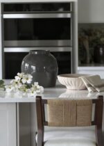 Close-up of vase silhouette detail on this Large White Dogwood Branch and Slate Vase Design