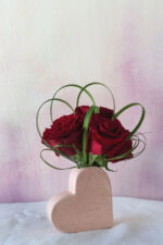 Close-up of vase silhouette detail on this Pale Pink Ceramic Speckled Heart Budvase decorative vase