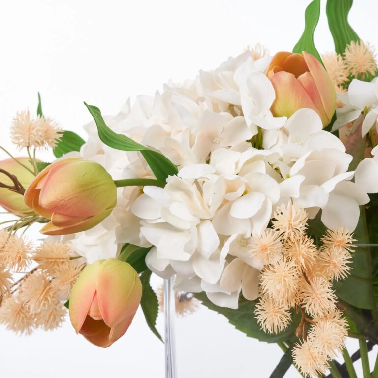 Close-up of vase silhouette detail on this Peaches and Cream - Real Water Illusion Arrangement