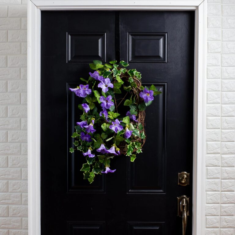 Close-up of blooms and berries on this Purple Petunia and English Ivy Spring Summer Wreath