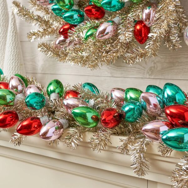 Close-up of greenery along the garland on this Razzle Dazzle Christmas - Gold Silver Tinsel