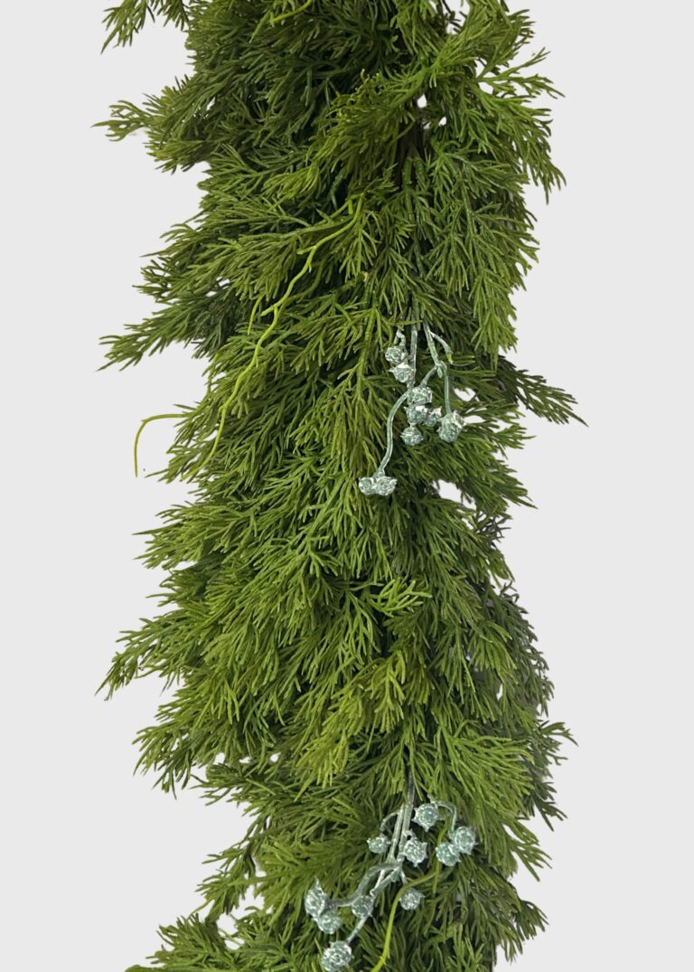 Close-up of greenery along the garland on this Deluxe Real Touch Juniper Winter Greens