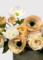 Close-up of bloom cluster detail on this Real Touch Rose and Anemone Potted Flower Arrangement