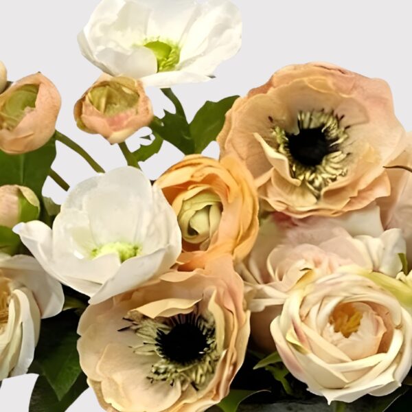 Close-up of bloom cluster detail on this Real Touch Rose and Anemone Potted Flower Arrangement