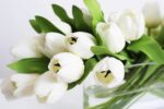 Close-up of vase silhouette detail on this Real Touch Tulip Spring Floral Oval Glass Vase