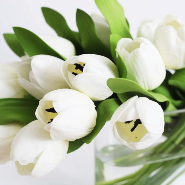 Close-up of vase silhouette detail on this Real Touch Tulip Spring Floral Oval Glass Vase