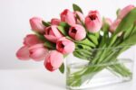 The Real Touch Tulip Spring Floral Oval Glass Vase shown in full, highlighting glass texture