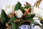 Detail view of stem and foliage layering from the Real Touch White Magnolia Floral Magnolia