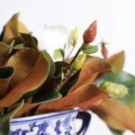 Full display view of the Real Touch White Magnolia Floral Magnolia Floral Arrangement with bloom