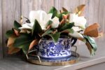 Second angle of the Real Touch White Magnolia Floral Magnolia Floral Arrangement focusing on full