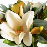Close-up of vase silhouette detail on this Real Touch White Magnolia Glass Cylinder Vase