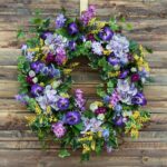 Detail view of layered greenery detail from the Royal Lavender Hydrangea, Lilac, Purple Spring Door