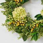Close-up of blooms and berries on this Green Hydrangea, Eucalyptus, Berry All Seasons Wreath