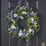 Alternate angle of the Blue Larkspur and White Freesia Front Door Wreath showing wreath face