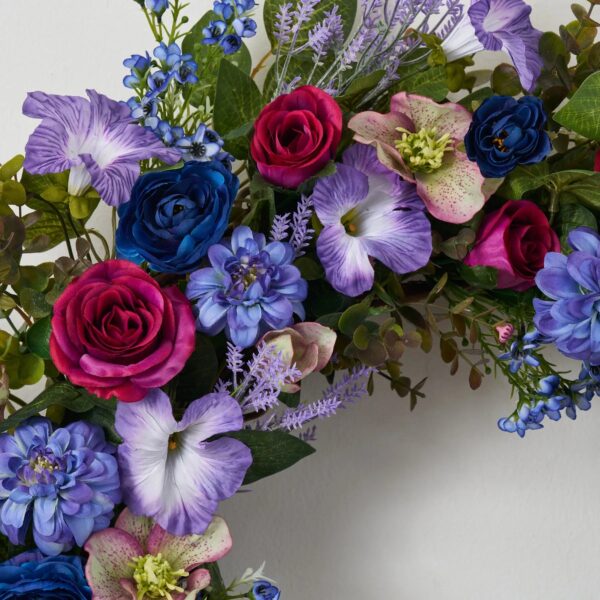 Close-up of blooms and berries on this Indigo Dreamer - Mixed Blue Front Door Wreath