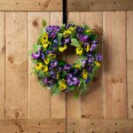 Alternate angle of the Pansy Perfection - Mixed Yellow Front Door Wreath showing wreath face