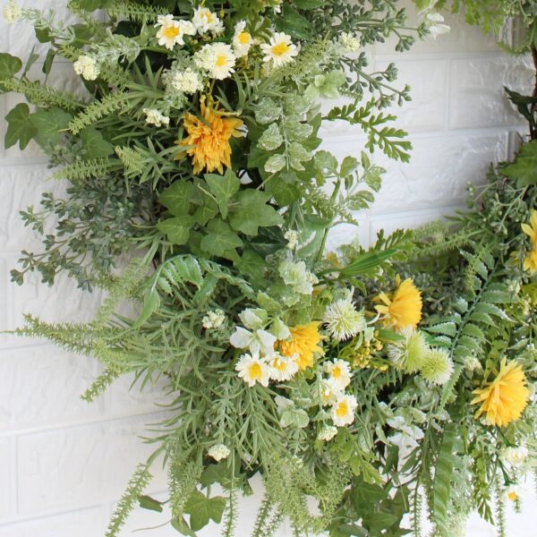 Close-up of blooms and berries on this Yellow and White Dried Summer Fall Wreath